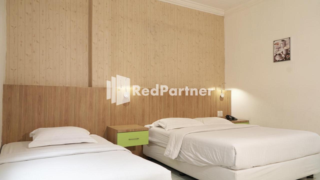 Wisma Sederhana Mitra Reddoorz Medan Buitenkant foto