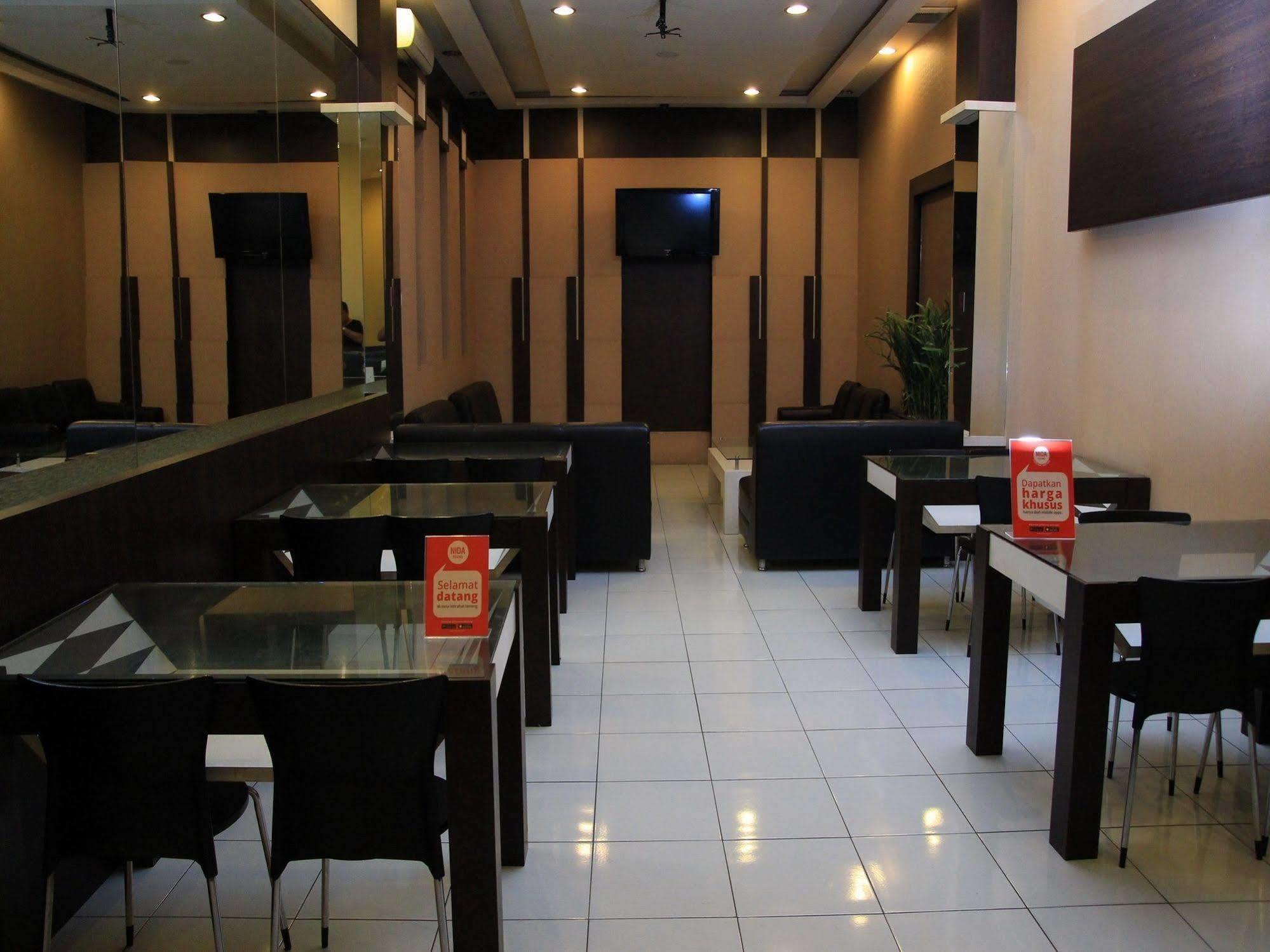Wisma Sederhana Mitra Reddoorz Medan Buitenkant foto