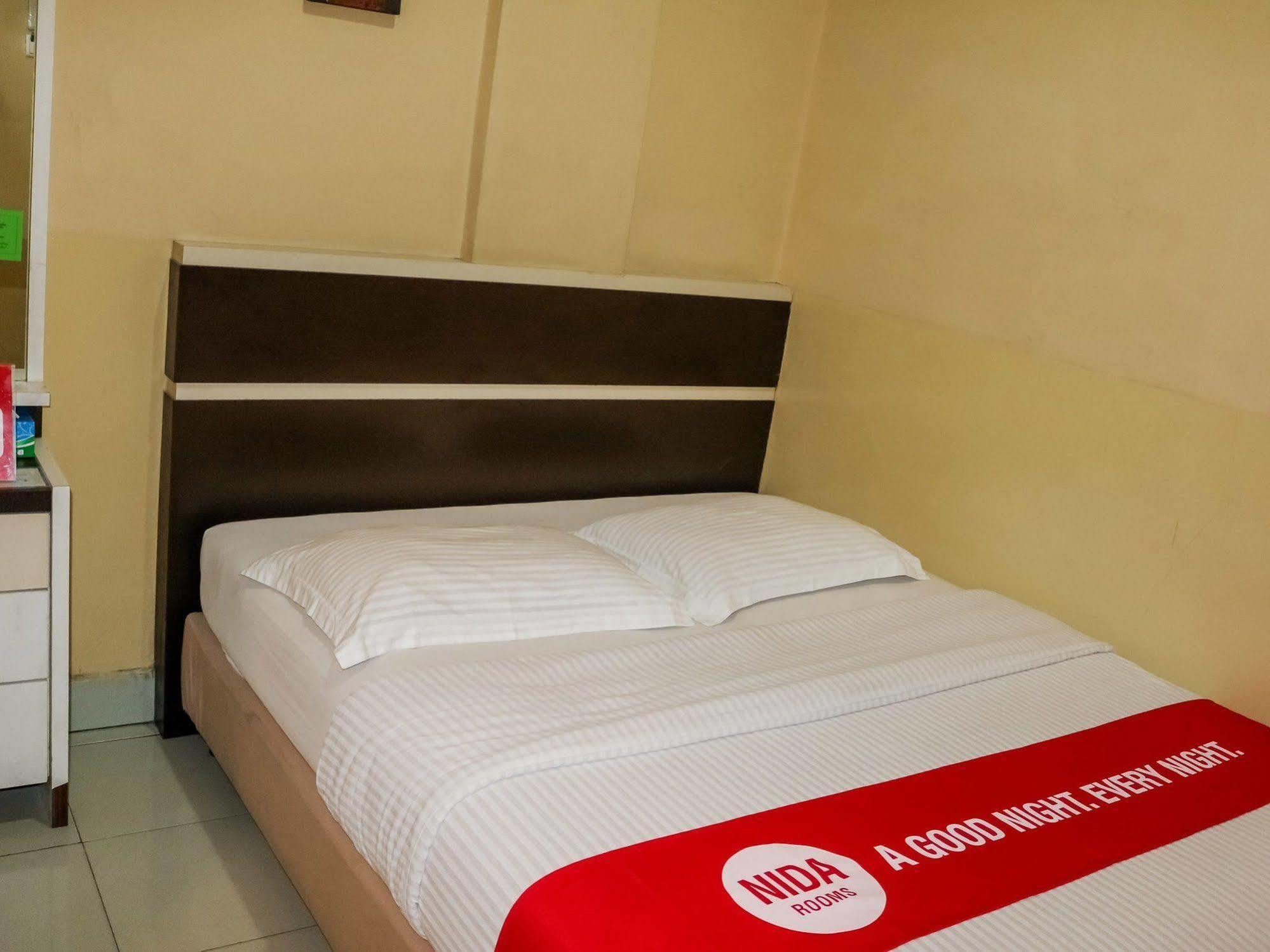 Wisma Sederhana Mitra Reddoorz Medan Buitenkant foto