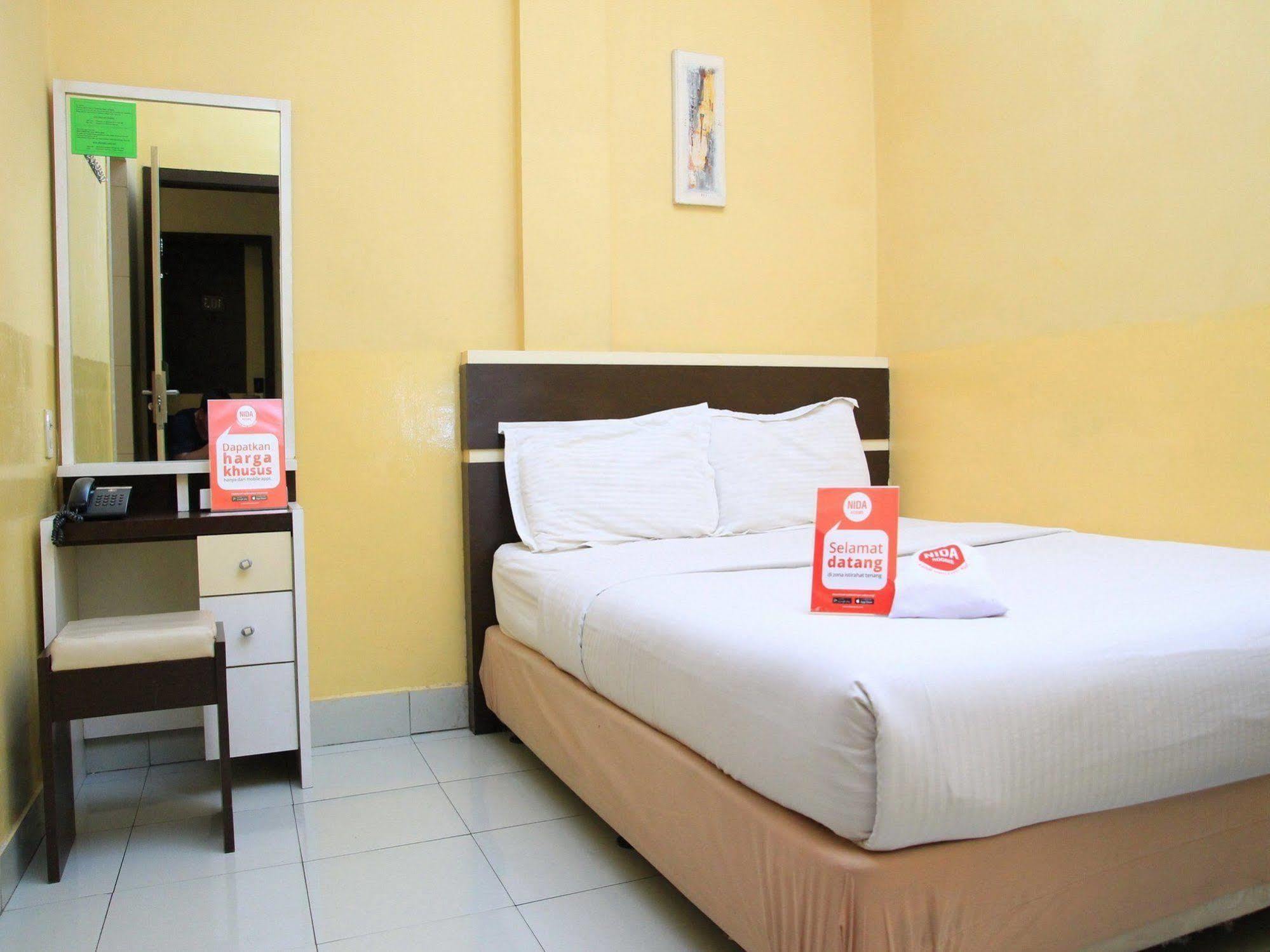 Wisma Sederhana Mitra Reddoorz Medan Buitenkant foto