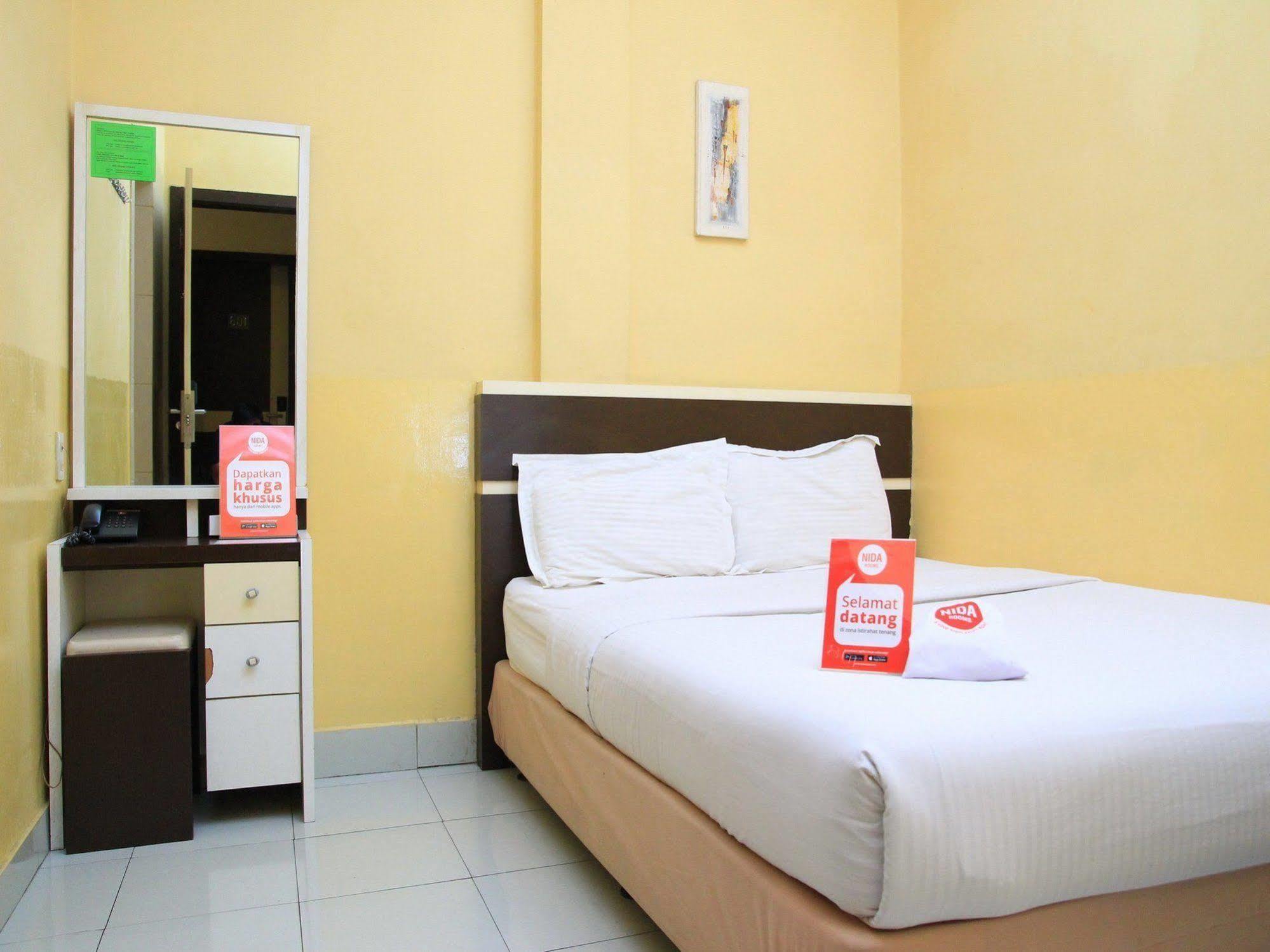 Wisma Sederhana Mitra Reddoorz Medan Buitenkant foto