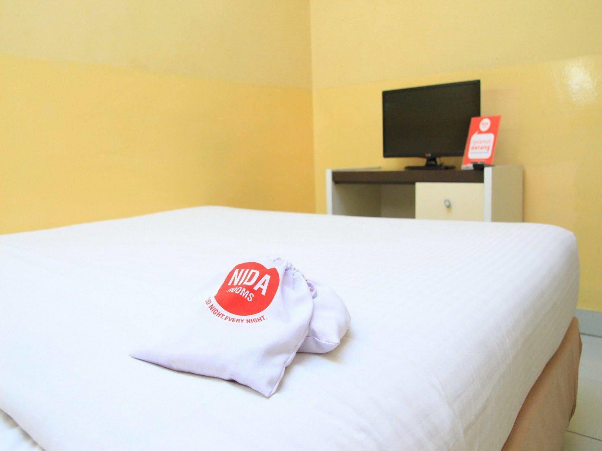 Wisma Sederhana Mitra Reddoorz Medan Buitenkant foto